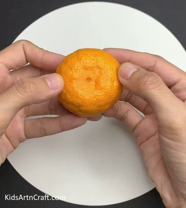 Taking An Orange - Making a Pretty Orange Peel Caterpillar with Kids