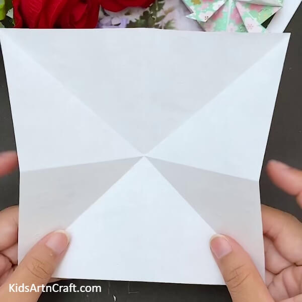 Make Some Fold Marks On The Sheet- Learning to produce a heart-shaped paper envelope through origami 