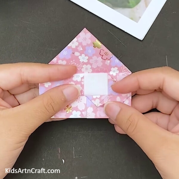 Make A Tiny Triangle On This Fold- This guide will explain how to fashion an Origami Heart Envelope in stages. 