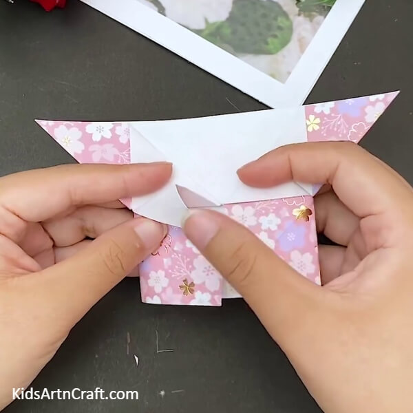 Repeating The Process Of The Other Side- Creating a heart-shaped envelope with origami instructions 