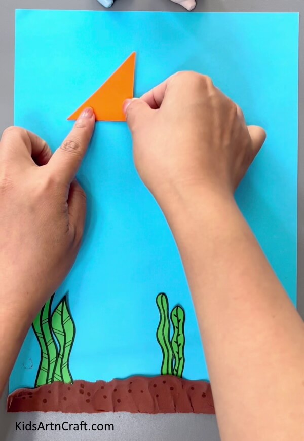 Pasting A Smaller Triangle-How to make origami fish - an uncomplicated tutorial for kids