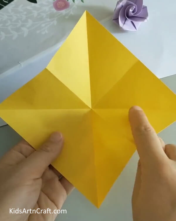 Create the creases- Instructions to craft a simple Origami Rose