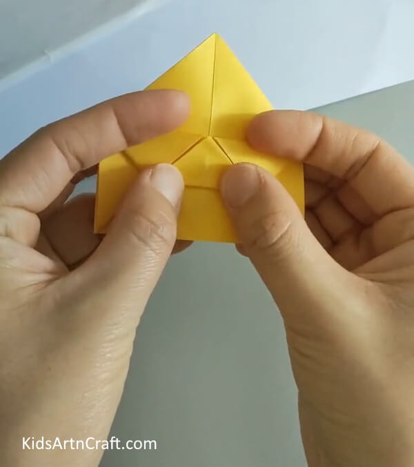 Fold the inverse triangle portion upwards- Creating a Rose with Origami - A Step-by-Step Tutorial for Newcomers 
