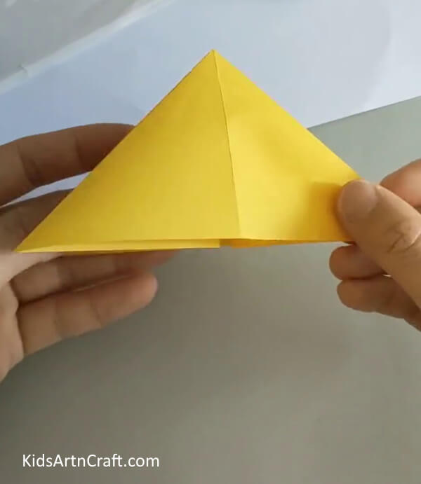 Fold it into a triangle- A Step-by-Step Process to Creating an Origami Rose Easily