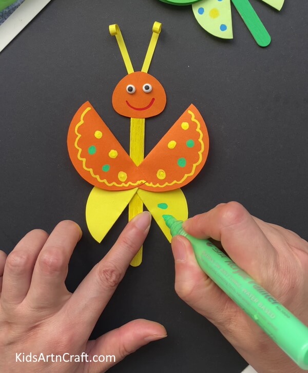 Complete Decorating The Wings - Step-by-Step Directions for Crafting a Paper Butterfly