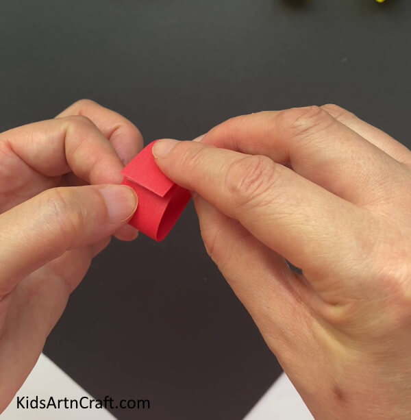 Rolling A Rectangular Paper Strip Here is a simple guide to help kids create Paper cherries 