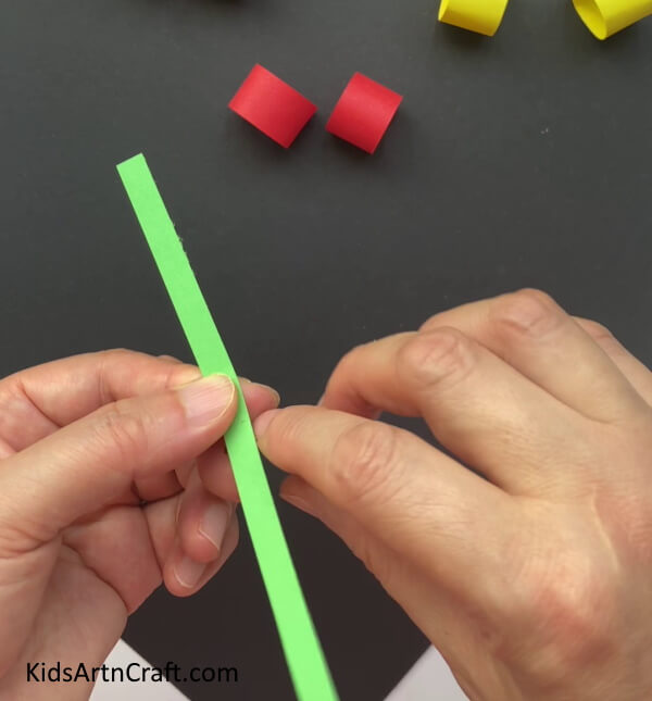 Making One More Red Ring And Folding Green Strip A straightforward tutorial to making Paper cherries with kids 