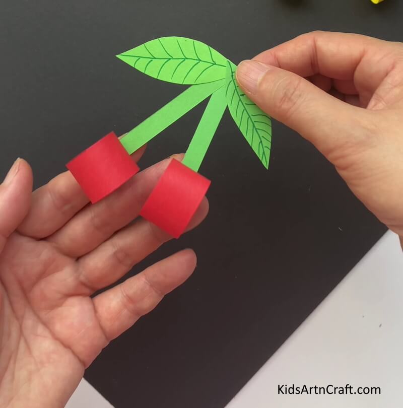 This Is The Final Look Of Our Paper Cherry! An instructional guide for kids on making Paper cherries 