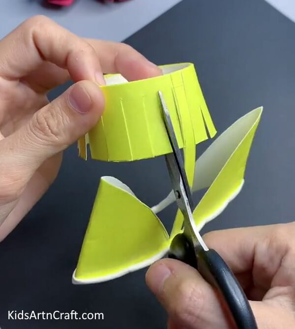 Cutting Petals - Crafting a Sunflower with a Previously Used Paper Cup for Children 