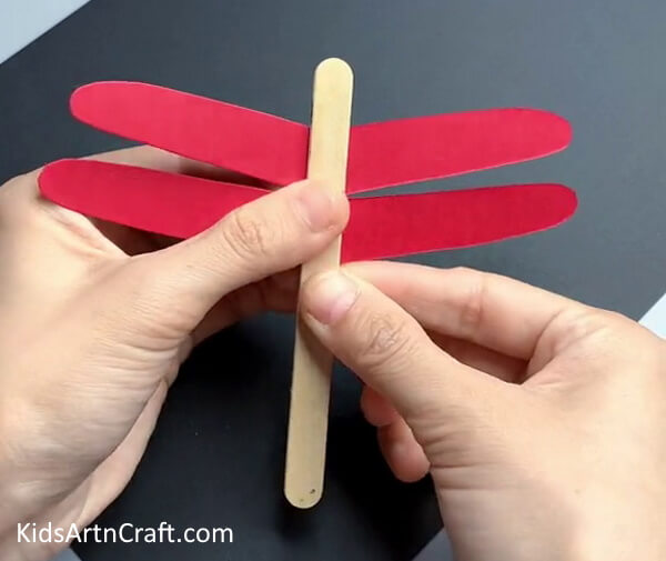 Pasting A Popsicle Stick- Crafting Paper Dragonflies for the Classroom 