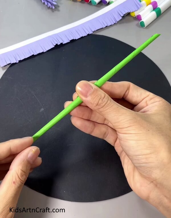 Rolling The Green Square Paper To Make A Stem - Creating a Paper Lavender Blossom Quickly and Easily 