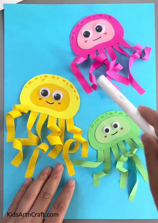 Stick All Octopus In A Plain Blue Sheet- Forming a Paper Octopus for Young People