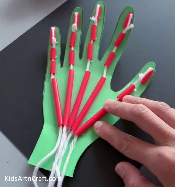 Pasting All The Straw Pieces - Crafting a Robotic Hand From Paper