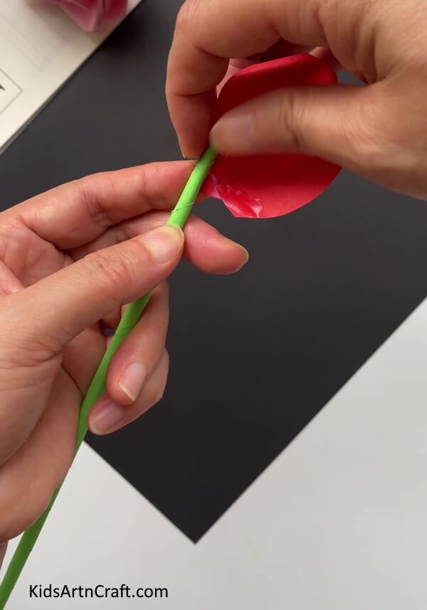 Pasting The Petal On The Stem Follow these instructions to form a paper rose flower for your kids. 