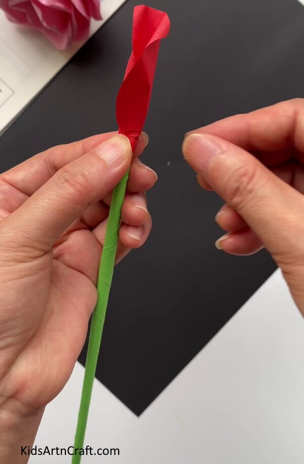 Pasting The Edges Of The Petal Learn how to assemble a rose flower from paper for your kids. 
