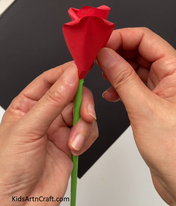 Adding Another Petal Get the instructions to make a paper rose flower for your children. 