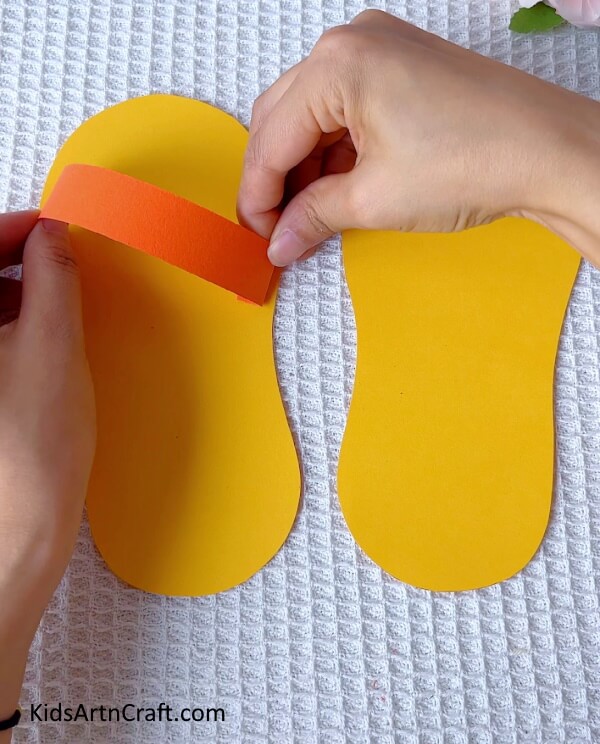Starting with the second pair of slippers- A Simple Guide to Making Paper Slippers - For Youngsters