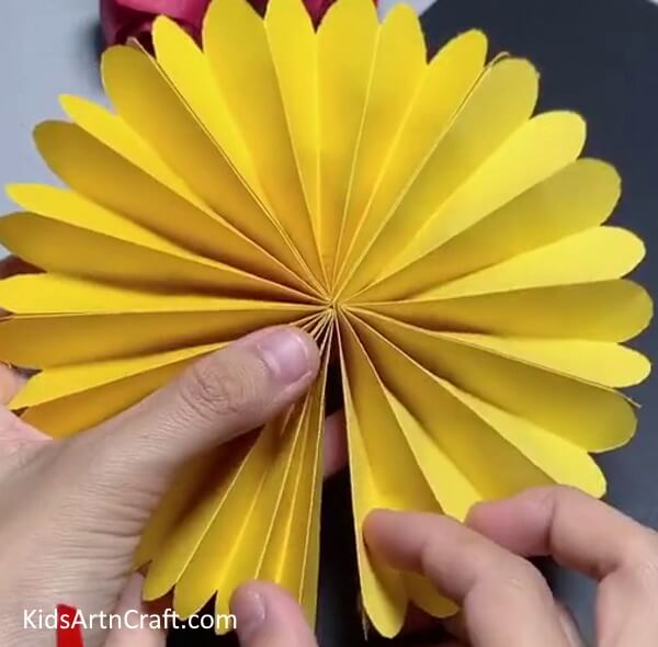 Joining the Ends of the Yellow Craft Paper - Making a Paper Sunflower Creation for tots