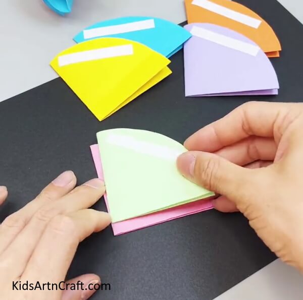 Pasting Quarter Over One Another - Constructing A Paper Umbrella That Is Simple For Kids To Do