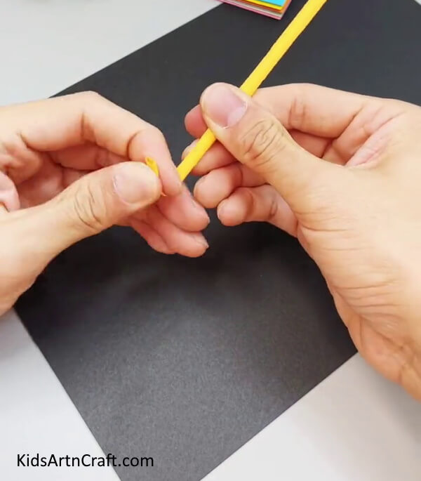 Bend The Roll To Make the Handle - Constructing A Paper Umbrella That Is Ideal For Kids