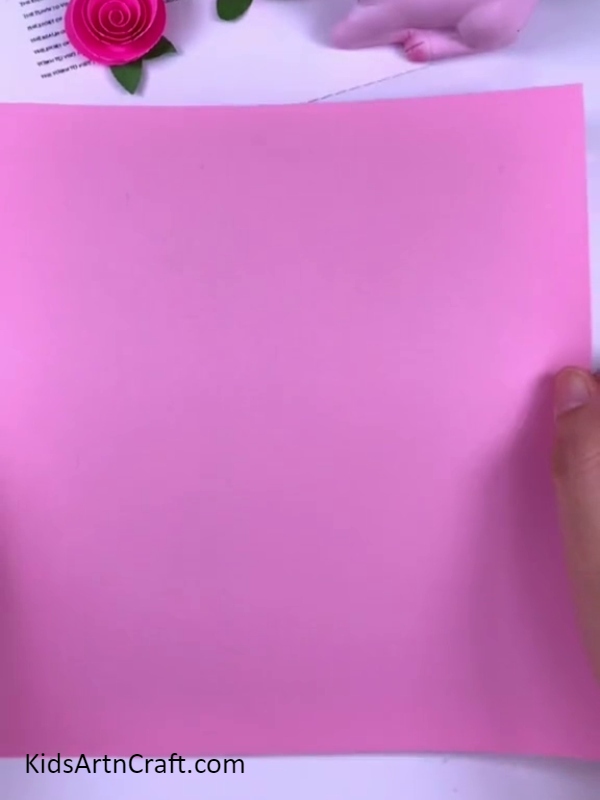 Cutting color paper to decorate puzzle board- Crafting a Peppa Pig Puzzle with Directions