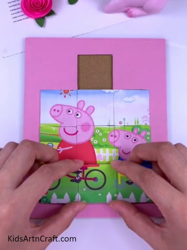 Placing all pieces into puzzle board- Directions for Making a Peppa Pig Puzzle Design