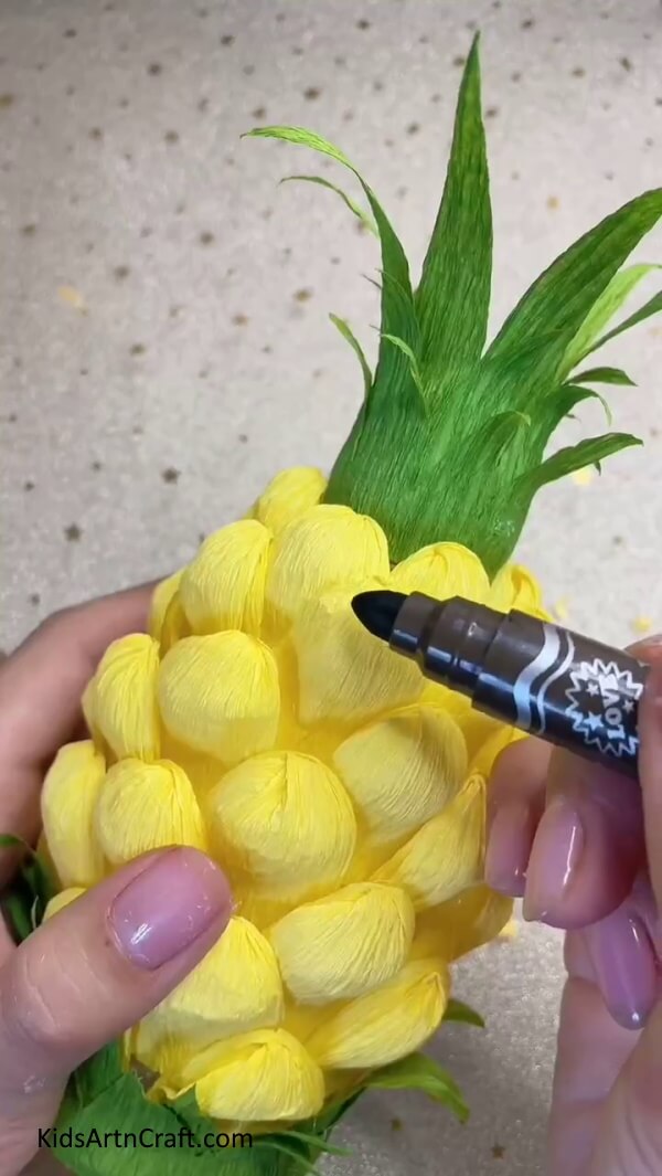 Getting A Black Marker-Constructing a Pineapple-style Hanging Light from a Plastic Bottle 