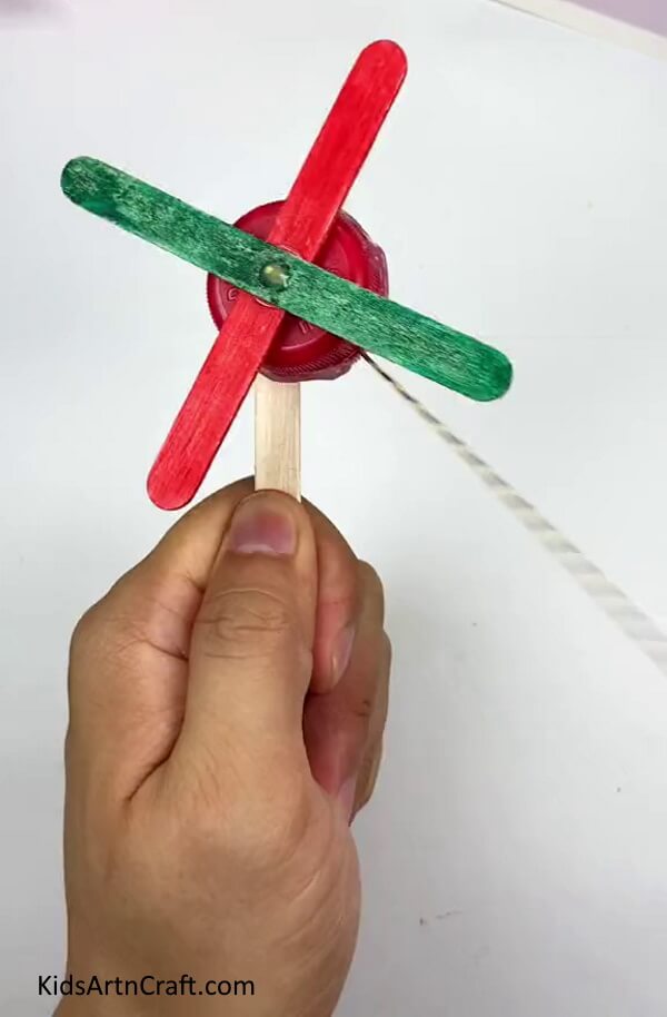 DIY Popsicle Stick Pinwheel Craft Using Bottle Cap For Kids