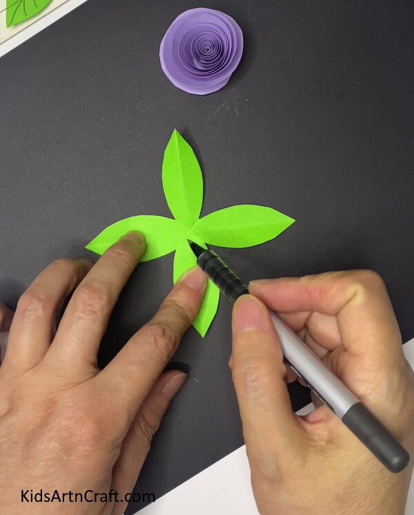 Drawing Veins On The Leaves Steps for Generating a Purple Paper Flower With Leaves