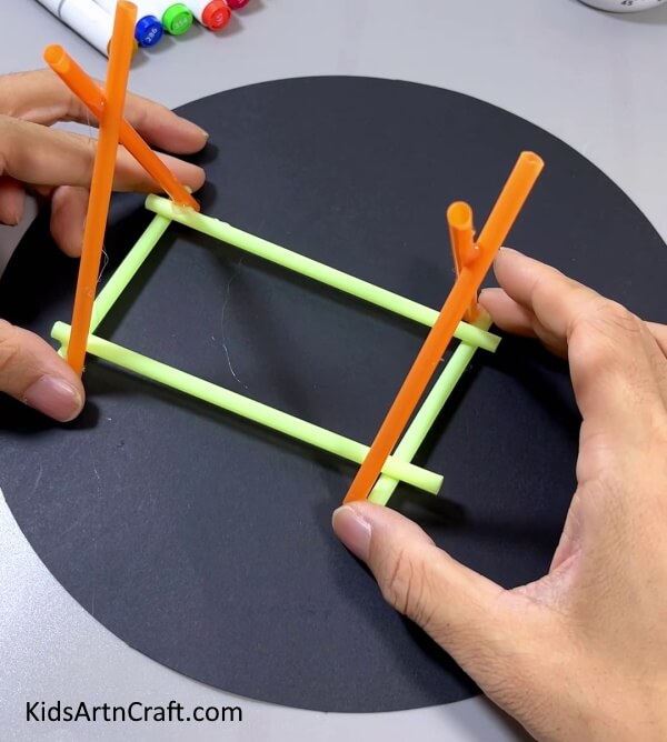 Pasting Another Triangle Perpendicular To The Base On the Other Side - A Creative Straw Swing Project Tutorial For Kids To Make
