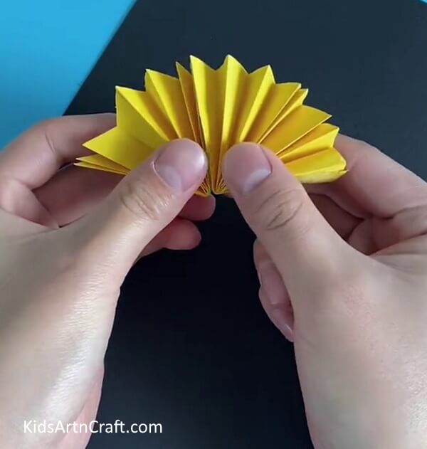 Making One More Pattern- Get a step-by-step tutorial to form a paper sunflower