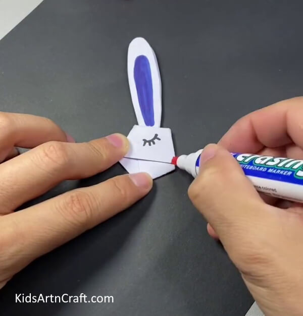 Drawing An Eye On The Face-A Guide to Constructing Bunny Finger Puppets for Children