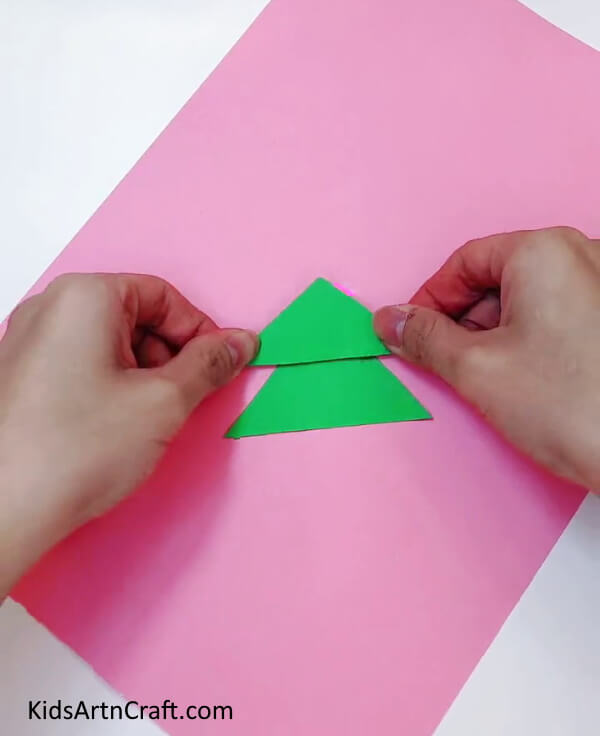 Making Green Triangles - Teach your children how to craft Christmas tree decorations.