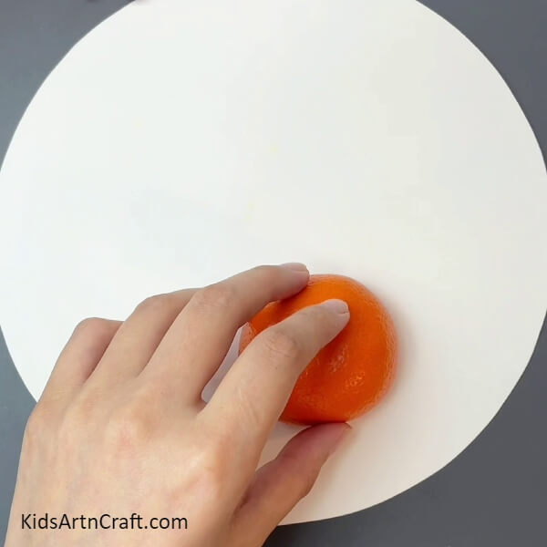 Sticking The Peel Over Paper-Master The Art Of Making A Crab Object With Orange Peel And Leaves 