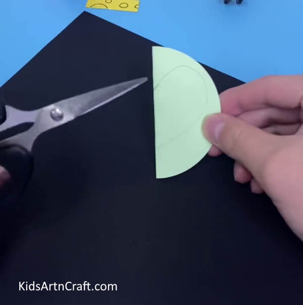Make Half Heart on Green Craft Paper- Gaining the skill to develop a basic Paper Mouse Craft for little ones 
