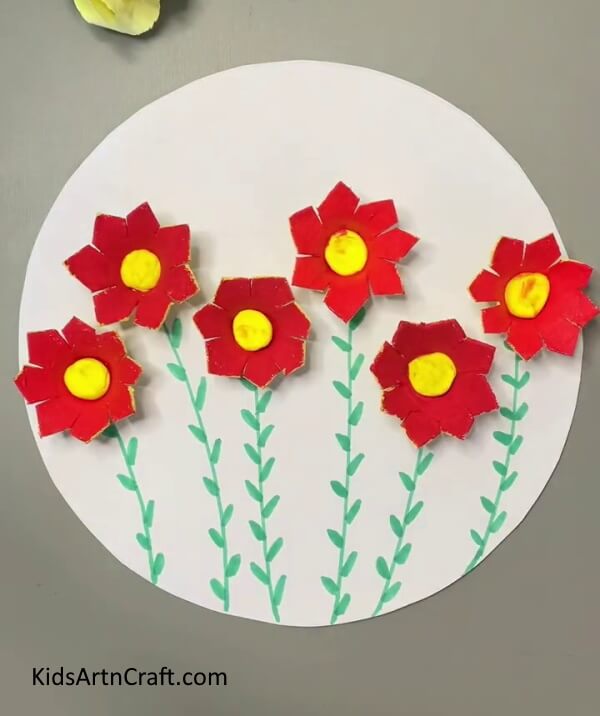 Beautiful flower with leaves is ready- Bees Craft Tutorial will show you how to make Egg Carton Blossoms
