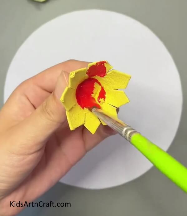 Painting the flowers- Make Egg Carton Flowers with Bees Craft Instructions