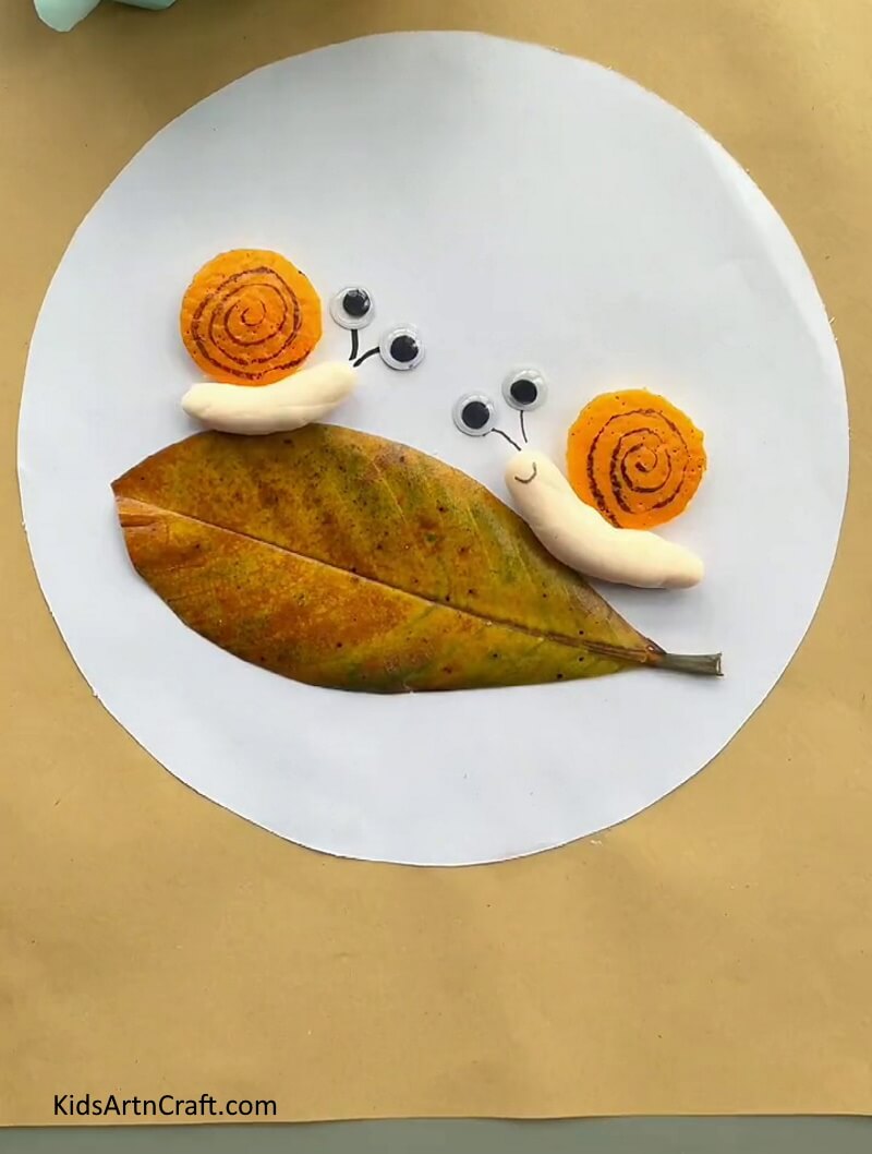 Congratulation Your Snail Craft Is Ready-Get up to speed on constructing Orange Peel Snail Art intended for children 