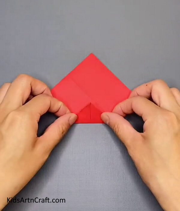Turn Your Red Craft Paper Upside Down- Grasp the process of building an Origami Paper Ninja Star by means of this craft tutorial. 