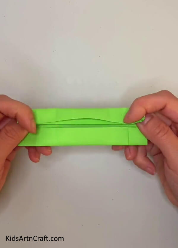 Folding To Form 2 Squares Over A Thin Rectangle-Step-by-step tutorial on making an Origami Snake for kids