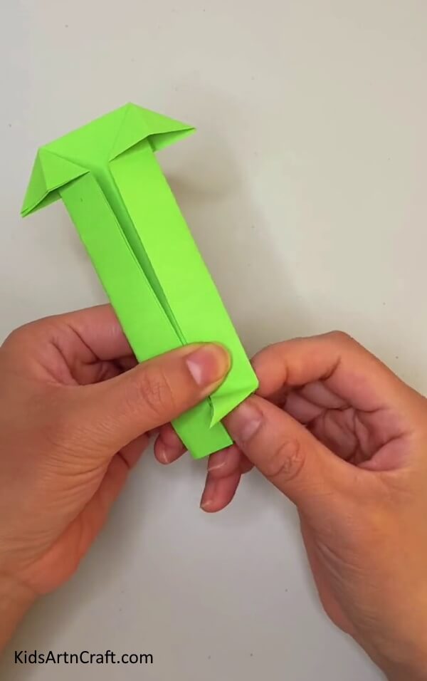 Making Diagonal Creases Of Checks-square-Get instructions on constructing an Origami Snake for children