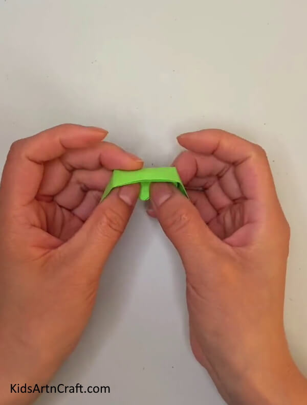 Completing Folding- Learn to form an Origami Snake Craft with these steps 