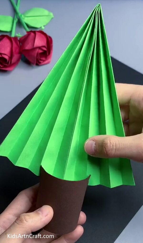 Attach The Trunk Cutout With The Green One for look better Paper Christmas Tree Craft