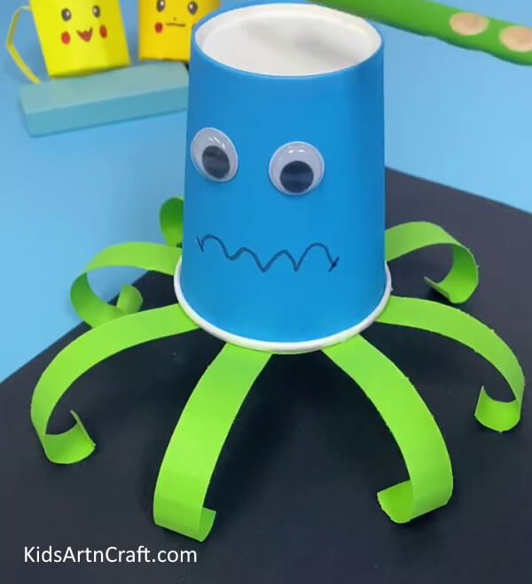 And It Is Finally Done !!!- Construct an octopus from paper cups with your toddler.