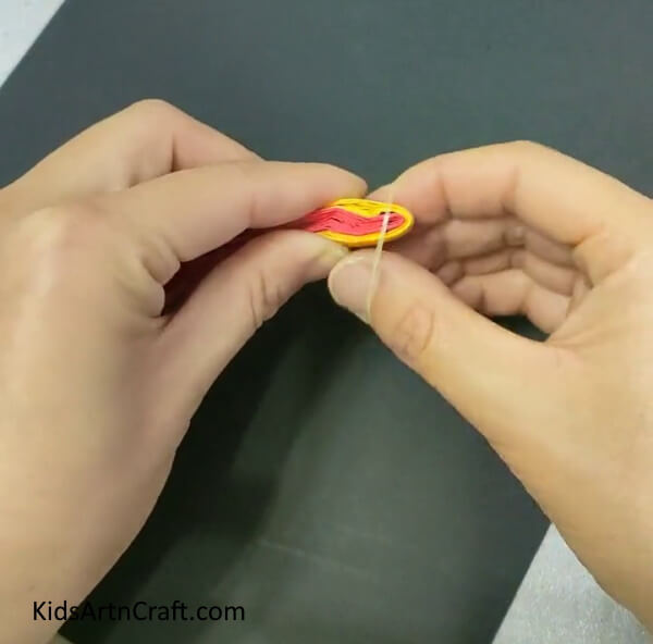 Tie An Elastic Rubber Band Over The Fans- Comprehend The Procedure Of Making A Paper Doll Toy Uncomplicated Knack For Youngsters