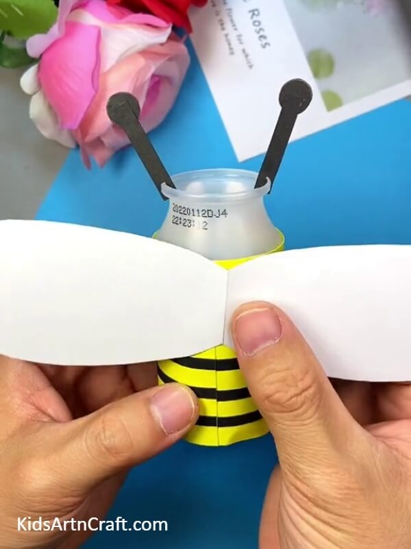 Add Big White Wings-Learn to form a bee out of a plastic bottle with this kid-friendly tutorial