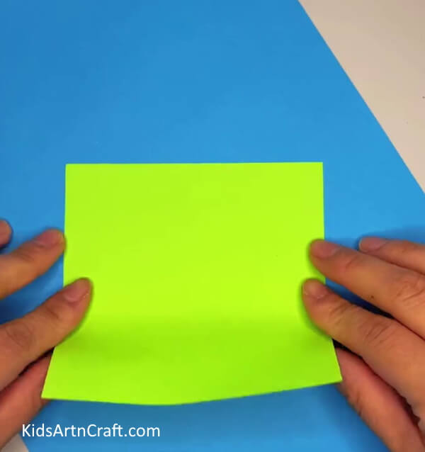 Getting A Green Origami Paper- Making a paper-constructed frog plaything for children is simple.
