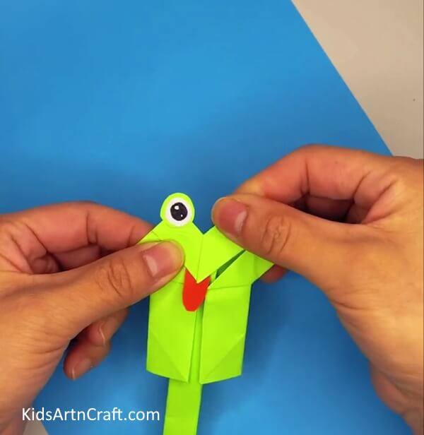 Pasting Eyes-Constructing a Paper Frog That Moves - An Easy Kids Craft