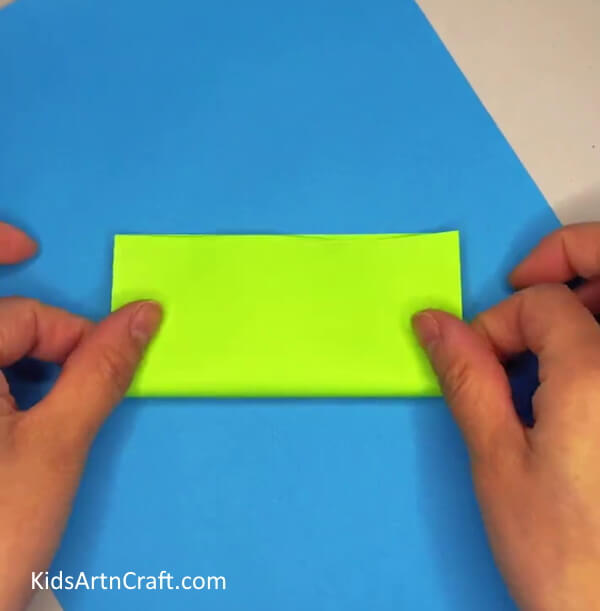 Folding In Half Horizontally- Crafting a movable frog out of paper is fun for kids.