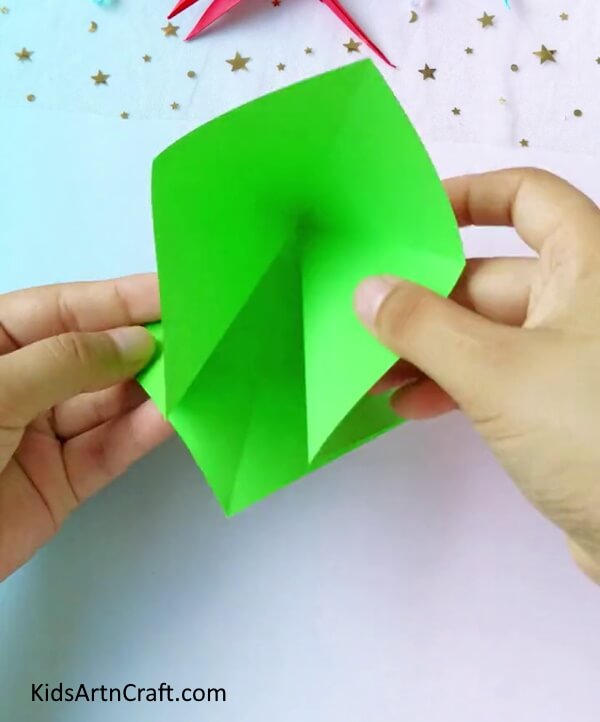 Folding The Paper To Form A Diamond Shape- This guide will show you how to make a dragonfly using origami paper, specifically for kids.